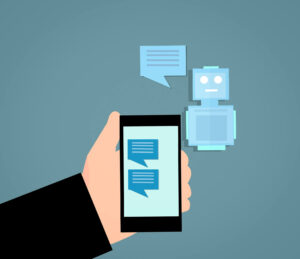 Hand holding phone with chatbot